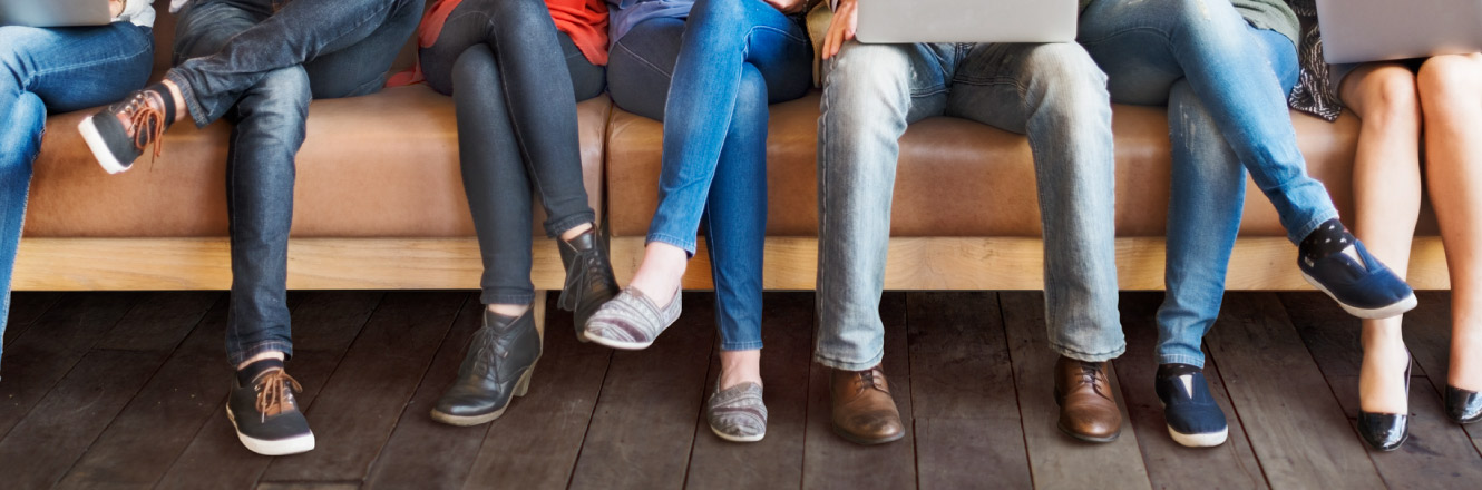 Individuals sitting on a bench