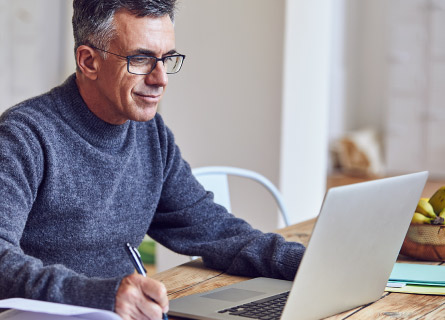 an individual working on their laptop