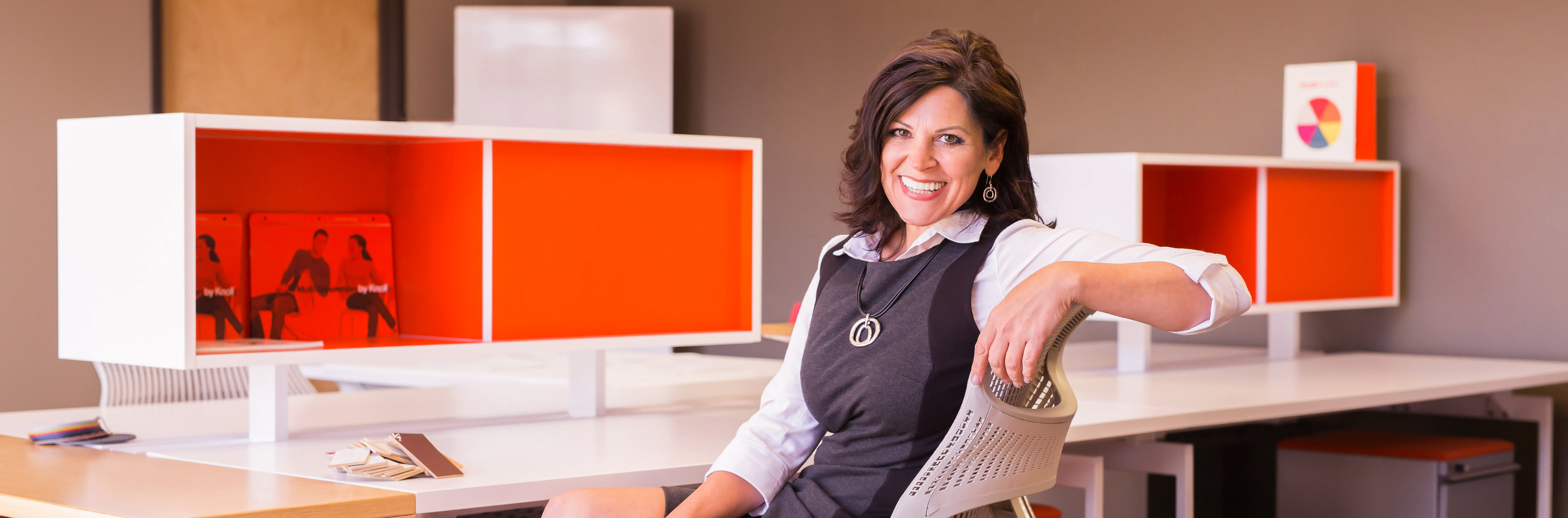 Individual sitting at a desk