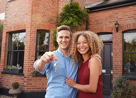 couple holding keys