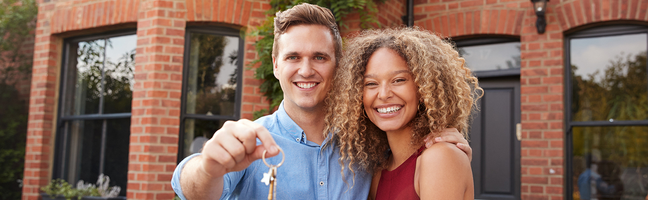 couple holding keys